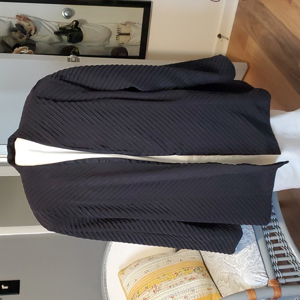 Vintage Sully Bonnelly silk jacket.